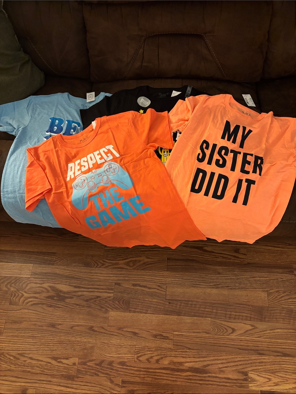 NWT graphic tees from the children place size large 10/12